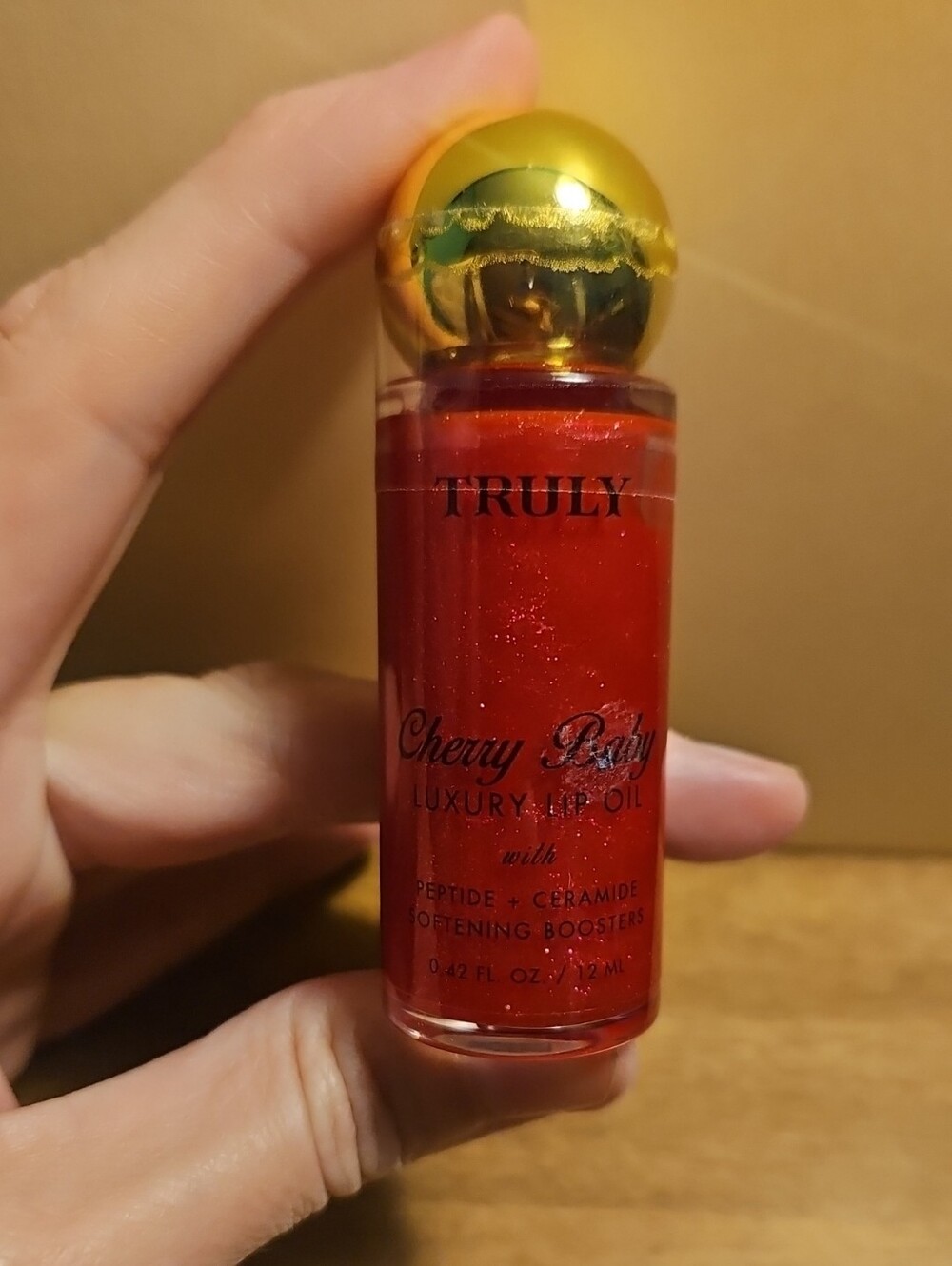 TRULY Cherry Baby Luxury Lip Oil — Shimmery Red with Gold Cap